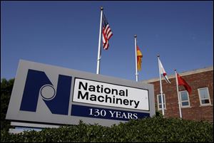 More than 500 workers lost their jobs in the sudden shutdown of National Machinery. When the plant reopened under new ownership, many were not recalled.