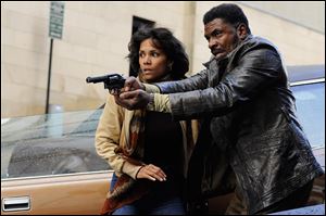 Halle Berry, left, and David Keith in a scene from 