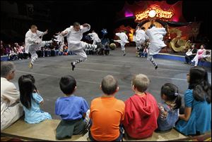 The Shaolin Kung Fu Warriors of the Ringling Bros. and Barnum and Bailey Circus, perform during a special show at the Huntington Center in Toledo on Friday.