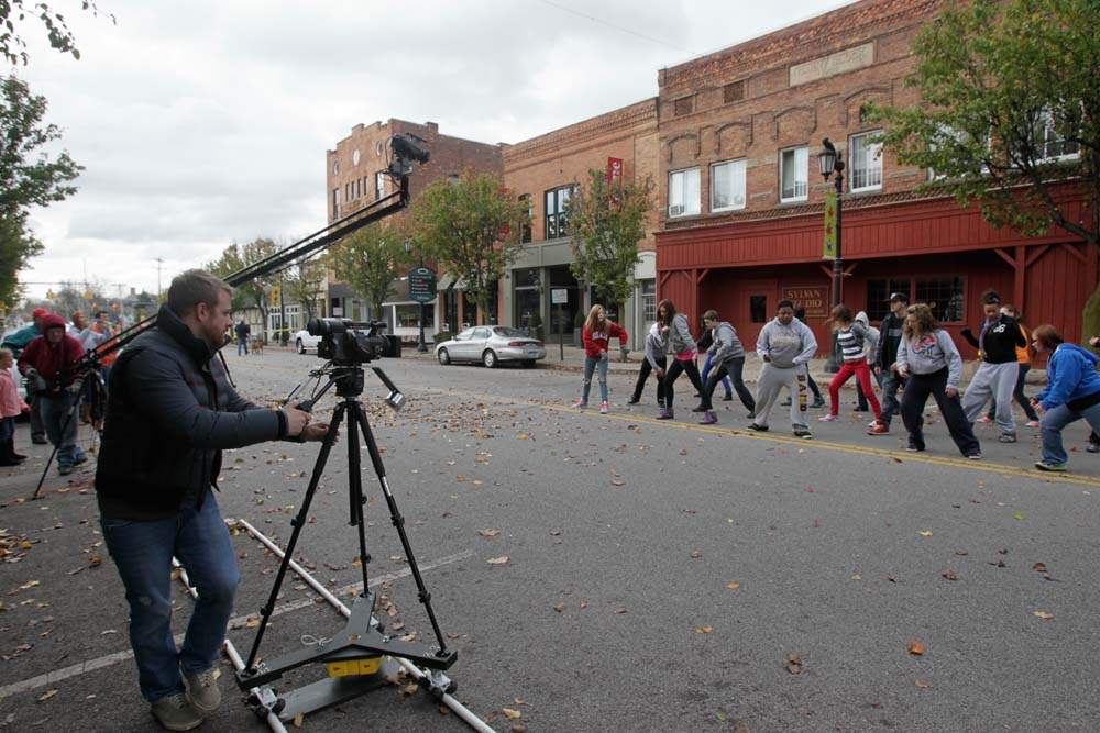 Charles-Simon-Straub-of-Toledo-left-filming-the-video