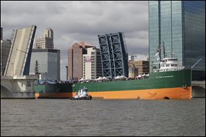 The S.S. Col. James M. Schoonmaker travels under the Martin Luther King, Jr., bridge on the Maumee River.