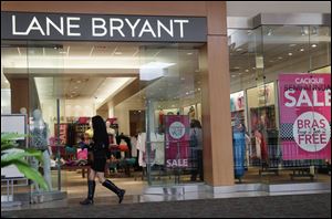 A pickup in consumer spending helped lift economic growth in the July-September quarter to a 2 percent annual rate.