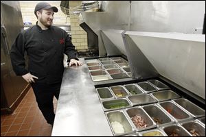 Chef Wes Wright prepares the mise en place at Ciao! Ristorante before the dinner rush.