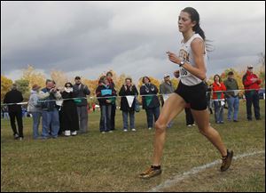 Janelle Noe was the Division I regional champion with a time of 18:32.38 and led Northview to the team title.