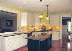 This spacious kitchen opens to the great room, an ideal layout for entertaining.