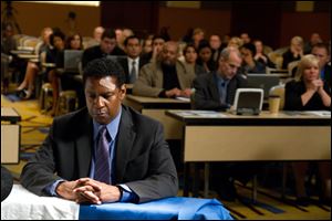 Denzel Washington portraying Whip Whitaker in a scene from 