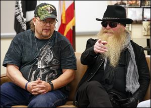 ZZ Top bassist Dusty Hill meets with veteran Tom Haley on Thursday. Haley was recently housed by the new Toledo-based Veterans Matter program.