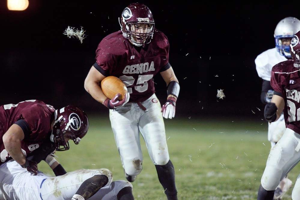 David-Nutter-of-the-Genoa-Comets-runs-the-ball-during-the