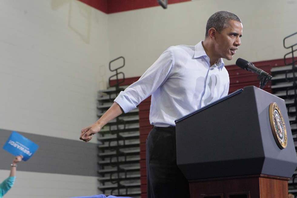 President-Barack-Obama-speaking-to-a-packed-gym-1