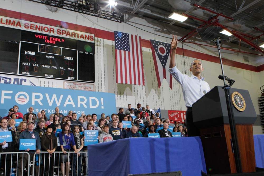 President-Barack-Obama-speaking-to-a-packed-gym