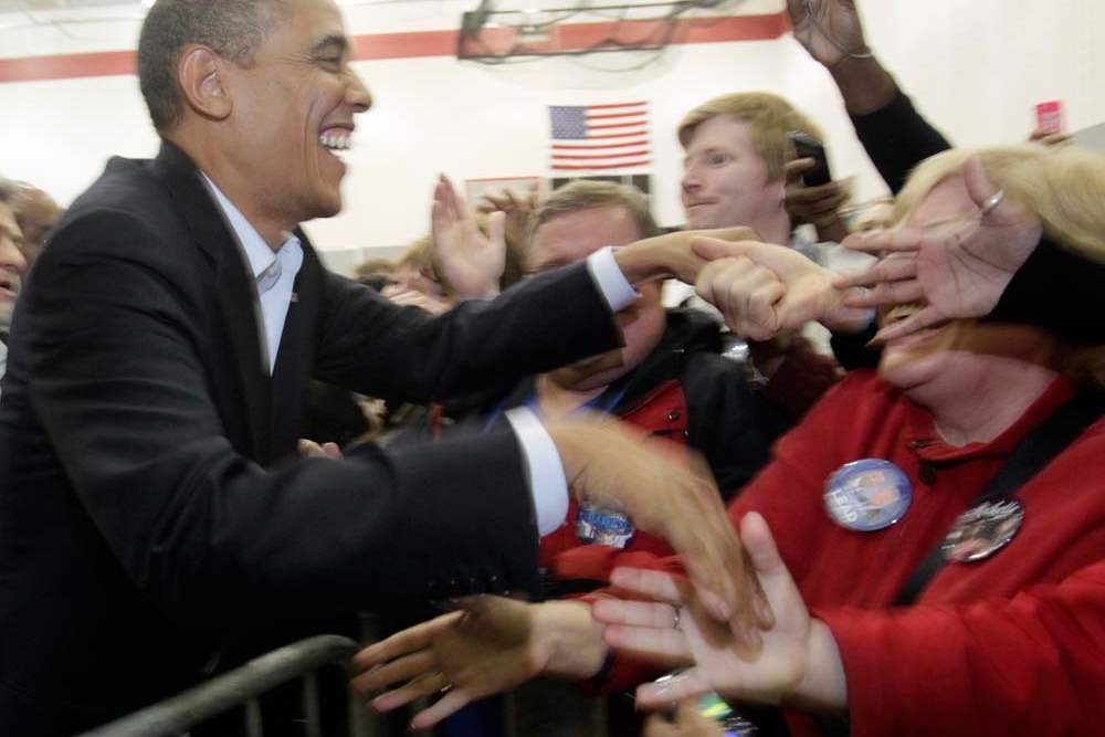 President-Obama-shakes-hands-with-the-overflow-crowd
