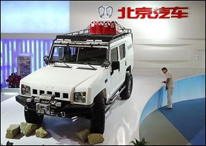 A Jeep made by Beijing Automotive Industry Corp. is on exhibit in Beijing in 2009. Chrysler’s joint venture with China began in 1985 but ended with the automaker’s bankruptcy in 2009.