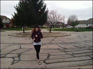 Reporter Kelly McLendon jogs through Sylvania.