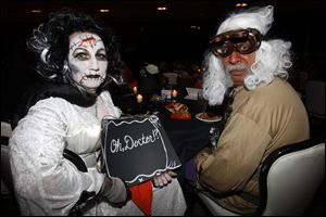 Lauretta and Paul Papp enjoy the spooky fun festivities at Ghoulwill Ball.