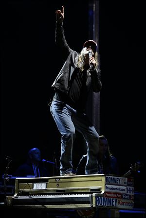 Kid Rock performs 'Born Free,' the Romney campaign theme song, before Mitt Romney's address to the crowd.