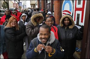 Obama supporters turned out in force to obtain tickets for the President’s recent Lima appearance. Gregory Pitts of Lima, center, was the first person to receive a ticket to hear the President speak.