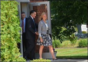 Republican presidential candidate Mitt Romney and his wife Ann leave the Church of Jesus Christ of Latter-Day Saints in Wolfeboro, New Hampshire.