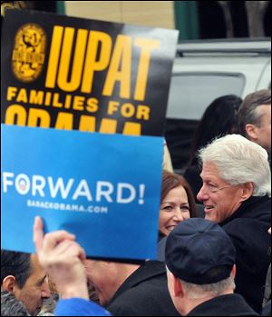 Larry Roberts/Post-Gazette    November 5, 2012  news  clinton    Former U.S. President works the crowd in Market Square after exhorting the crowd to get out and vote to give President Barrack Obama another four years, November 5, 2012. NOT A BLADE PHOTO