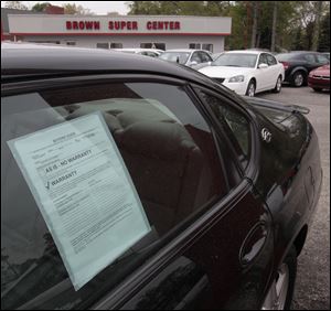 Prices for used cars are predicted to rise nationwide, including at Midwest lots such as this on Central Avenue in metro Toledo.