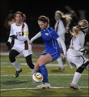 St. Ursula’s Megan Rafac stops the ball against Walsh Jesuit during their game Tuesday.