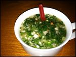 Miso vegetable soup (includes mushroom, spinach, green onion, and carrot).