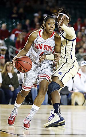 Ohio State's Tayler Hill, left, drives around Notre Dame's Jewell Loyd during the second half of an NCAA college basketball game in the Carrier Classic onboard the USS Yorktown in Mount Pleasant, S.C., Friday, Nov. 9, 2012.  (AP Photo/Mic Smith)