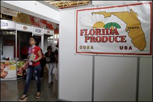 People attend the 30th Havana International Fair last week in Havana, Cuba. Many of America's best-known brands were on display, though Cuban purchases of U.S. goods have plunged as the island increasingly turns to countries like China, Brazil, Vietnam and Venezuela, which offer cheaper deals, long-term credits and less hassle over payment and shipping.