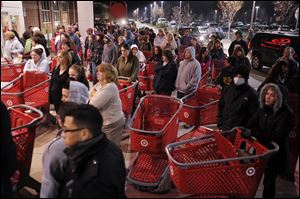 Target Corp. will open its doors at 9 p.m. on Thanksgiving, three hours earlier than a year ago, to kick off the holiday shopping season. The discounter joins several other major retailers, including Wal-Mart Stores Inc., that are opening earlier in the evening on the holiday and staggering deals over the two-day period.
