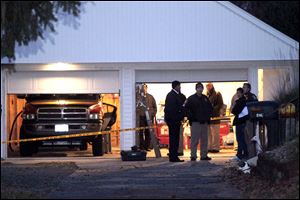 Authorities respond to a report of carbon monoxide poisoning on Harvest Lane in Toledo.