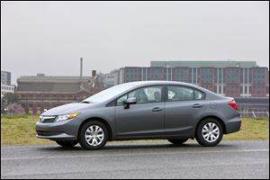 The 2012 Honda Civic LX sedan has drawn complaints that its design lacks pizazz, even though sales are strong. Next year’s model looks more sporty. Driving characteristics are changing, too.