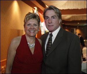 Radio personality Mary Beth Zolik, seen here last year with fellow emcee Rick Woodell at the American Heart Association's 14th annual Glass City Heart Ball 