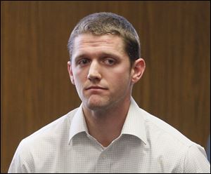 Matthew Warner, a former Washington Local school teacher and coach, sits in court at his February sentencing.