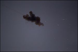 An Explosion of an Iron Dome missile to intercept a rocket fired from Gaza Strip towards Israel, as seen from the Israel Gaza Border, southern Israel, Saturday.