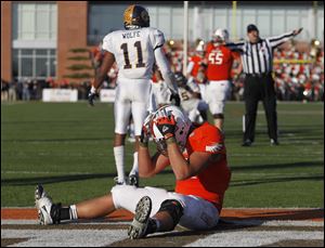 BGSU's Alex Bayer reacts to missing a touchdown pass against Kent State during 2nd half of game at BGSU's Doyt Perry Stadium in Bowling Green, Ohio.