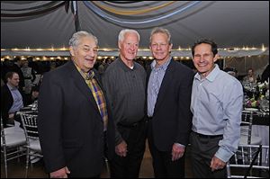Attending the ProMedica Hospice and Dementia Care were from left, Promedica's wine event honorary chairman Russ Ebeid, VIP guest and pro hockey Hockey Hall of Fame member Gordie Howe, Randy Oostra, ProMedica CEO, and Dr. Murray Howe, son of Gordie Howe.
