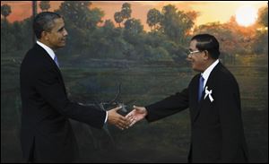 President Obama is greeted by Cambodia's Prime Minister Hun Sen in Phnom Penh, Cambodia, Monday.