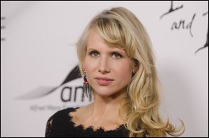 Lucy Punch plays BJ, a co-worker and sidekick of Kate in the new Fox show 'Ben and Kate.'