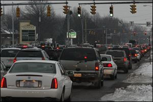 AAA, the former American Automobile Association, has predicted a slightly higher number of Americans will travel more than 50 miles from home this Thanksgiving than they did a year ago, but says trips will be shorter to keep expenses down.