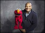  'Sesame Street' muppet Elmo and his former puppeteer Kevin Clash.