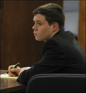 Andrew Roberts of Saline, Mich., listens to cross-examination during his aggravated vehicular homicide trial in Lucas County Common Pleas Court. He drove a pickup that struck a guardrail in October, 2011, causing the death of Erik Parks of Saline.