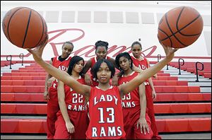 Members of the Rogers basketball team include, from front Tori Easley; second row, Jasmyne Smith and Quelle Williams; back row, from left, Cha'Ron Sweeney, Sasha Dailey, and Keyanna Austin.