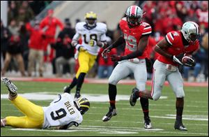 Ohio State safety C.J Barnett intercepts a Michigan pass late in the game.