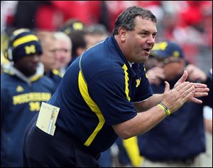 Michigan head coach Brady Hoke saw his Wolverines lose 26-21 to Ohio State on Saturday in Columbus. Bowl-schedule practices will give UM time to sharpen its two-quarterback system and a win against a good opponent in a holiday bowl game might change the last impressions of this team.