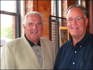 Tom Schlachter and Tony Knight visit during the reception for The Art of Robert Heindel at the Sur St. Clair Gallery, July 18, 2012. Mr. Knight recently discussed the fiscal cliff with White House council members.