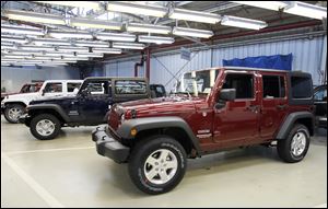 Jeep Wranglers are lined up at the Chrysler Toledo Assembly Complex.