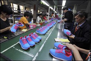 Chinese-made goods such as these shoes would be less desirable than U.S.-made counterparts to China’s prospering middle and upper classes, said Paul Zito of the Regional Growth Partnership.
