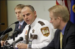 Morrison County Sheriff Michel Wetzel speaks at a news conference Monday, in Little Falls, Minn.