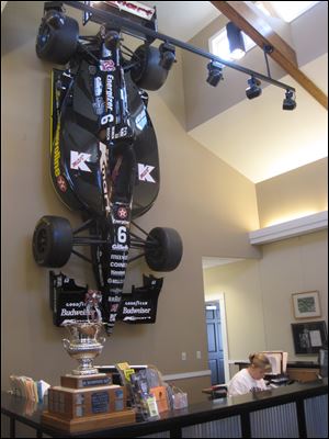 A race car is mounted to the wall at Elkhart Lake's Road America.