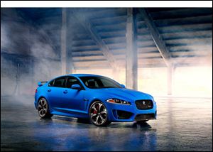 The 2014 Jaguar XFR-S sedan sports a 550-horsepower supercharged V-8 engine that avoids a gas-guzzler tax by getting 23 mpg on the highway. The car starts at $99,000 and goes on sale this summer.