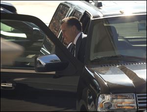 Former Republican presidential candidate Mitt Romney arrives at the White House for a luncheon with President Barack Obama.